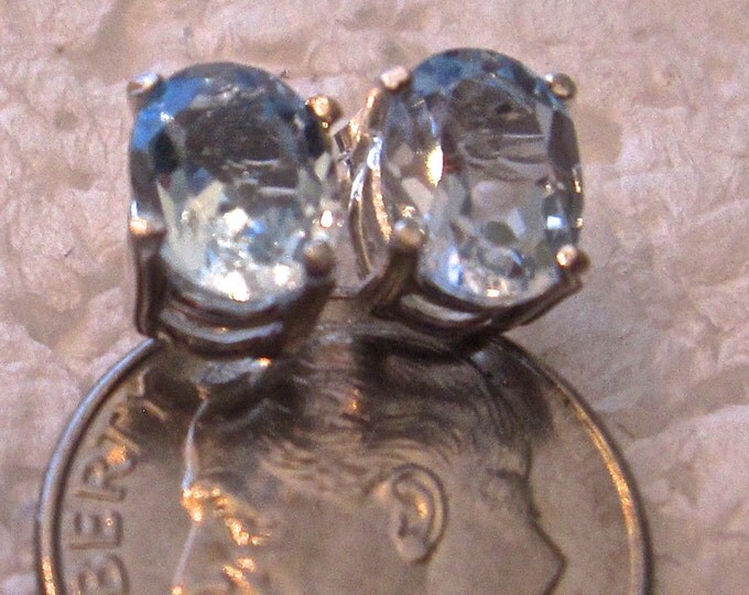 Sky Blue Topaz Studs,8x6mm Oval, Natural, Set in Sterling Silver E813