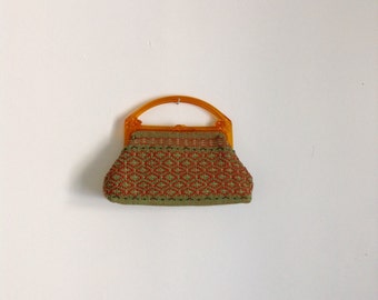 orange and green purse