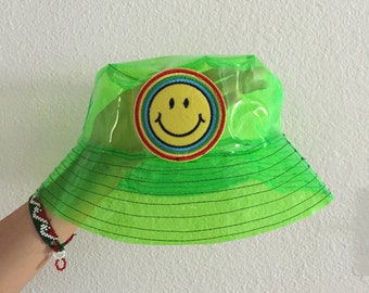 Green neon smiley face bucket hat, grunge bucket hat, rave, vapor wave, see through hat, waterproof hat, rain coat, festival accessories