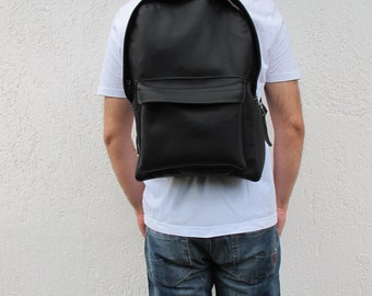 Leather Backpack available in 16 colors and two sizes. Unisex