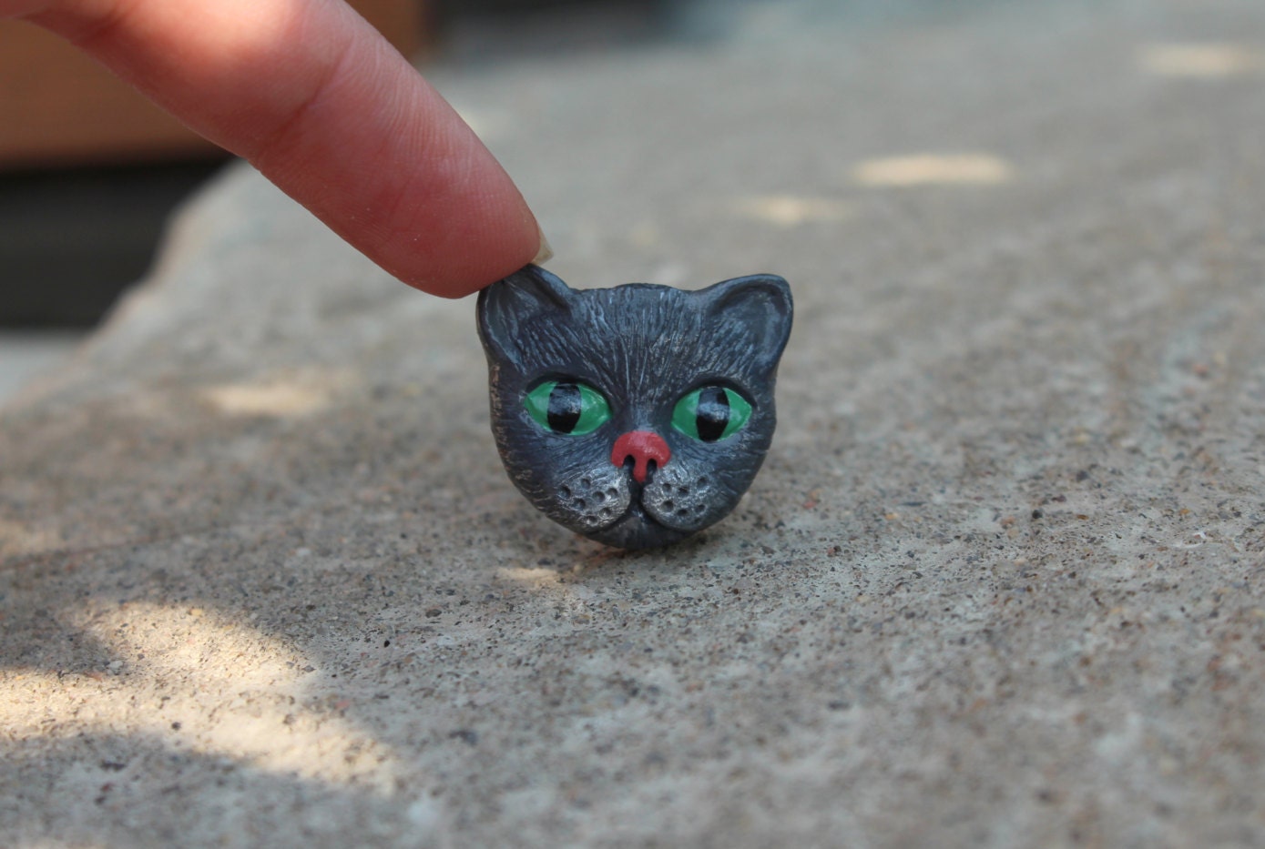 Handmade polymer clay grey cat face cabochon