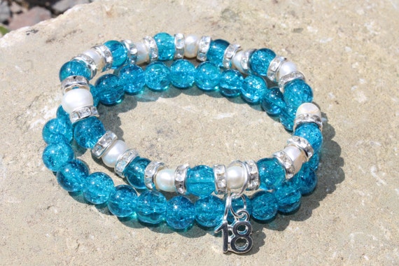Glass beaded Elasticated bracelet with a 18 Silver Plated