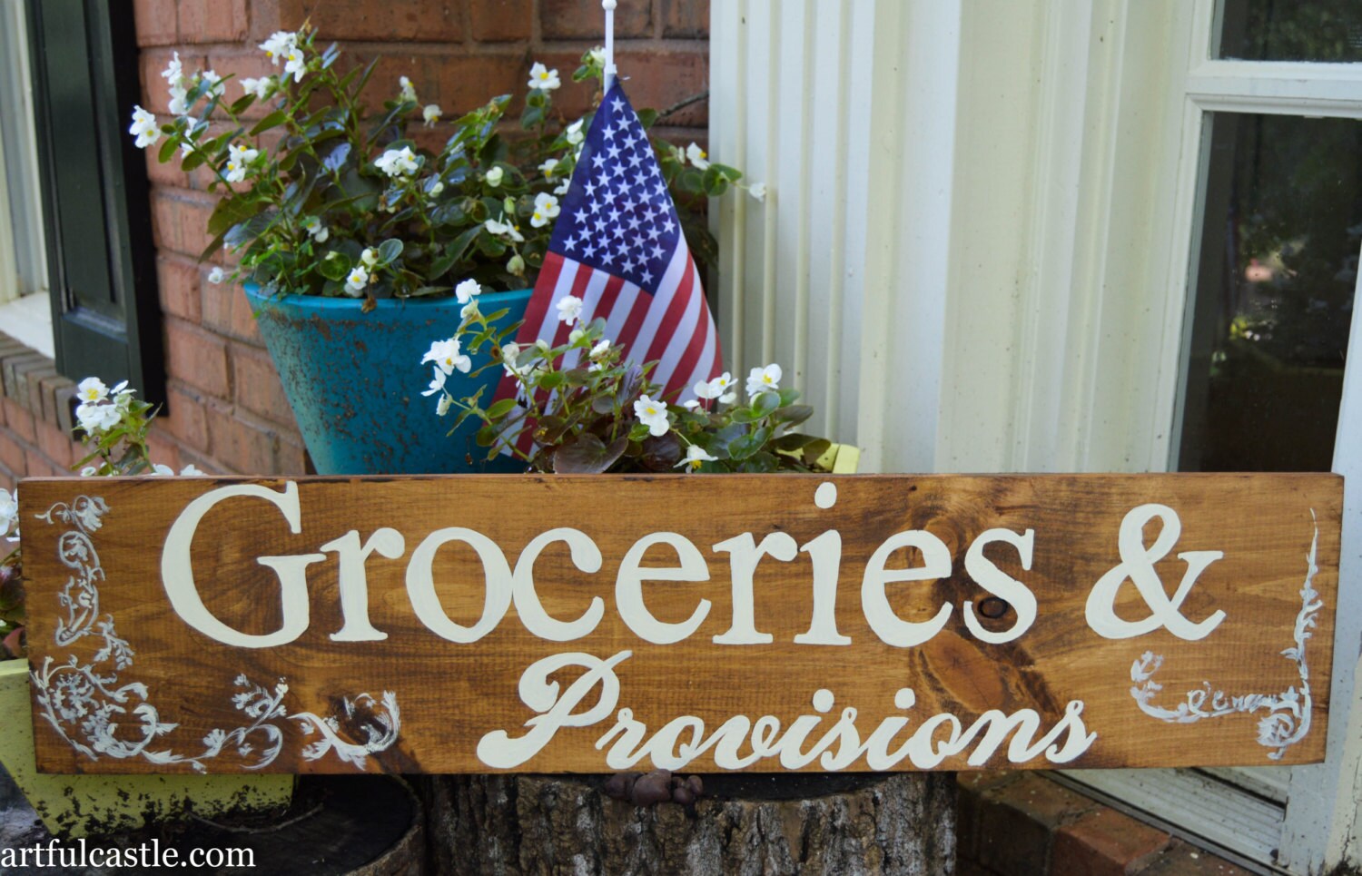 Wood sign with a handpainted Groceries and