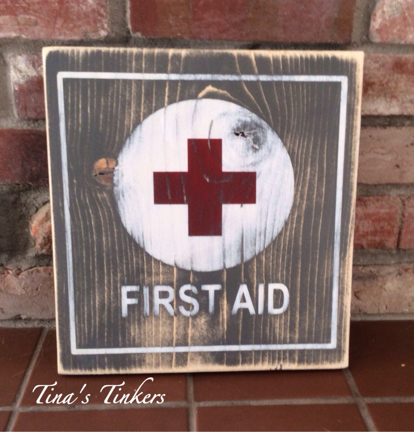 Vintage first aid painted wood sign. First aid station.