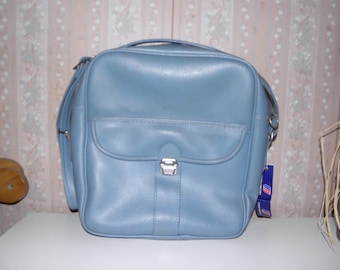 large over the shoulder blue travel/carry on by Travel Pro. inc.