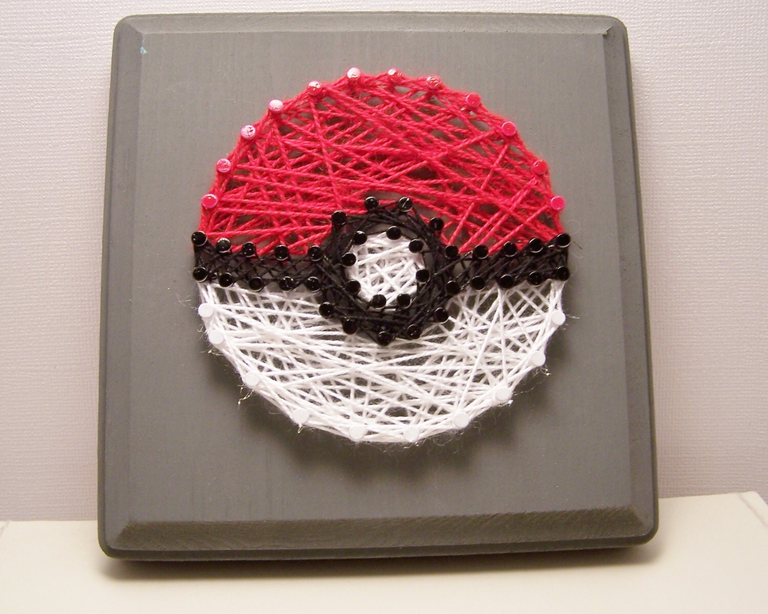 Pokeball inspired string art. Pokemon inspired. Pikachu. Gotta catchem