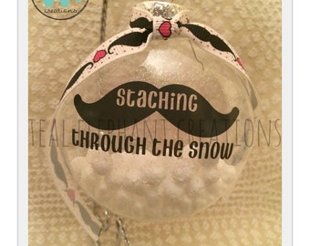 staching through the snow ornament