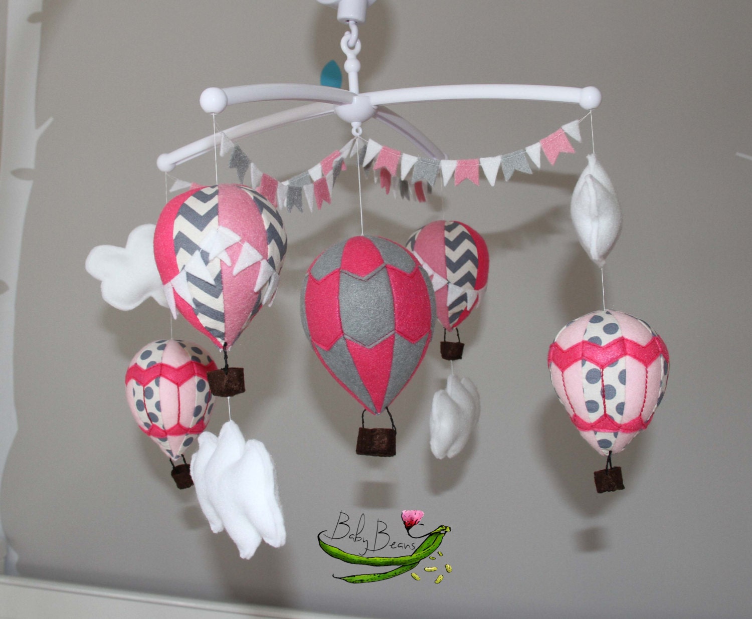 With MUSICAL CRIB ATTACHMENT. Baby girls pink & grey hot air