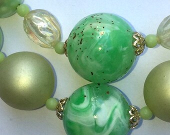 Green vintage beaded necklace - lots of vintage charm