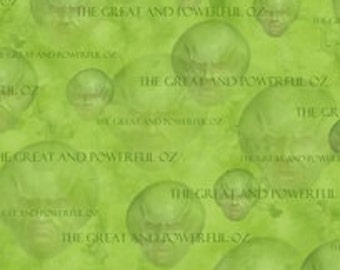 Wizard of Oz - 75 Years of WIckedness Green The Great and Powerful Oz Tossed Heads fabric - 1 yard