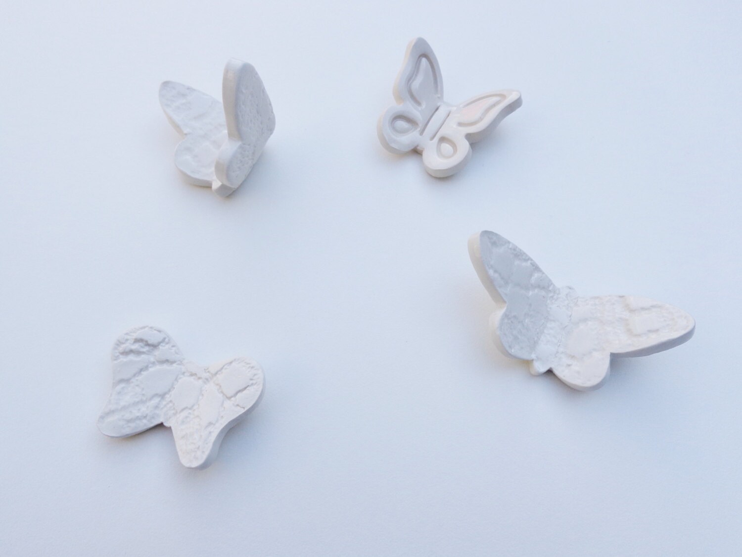 White 3D butterflies ceramic wall art installation handmade