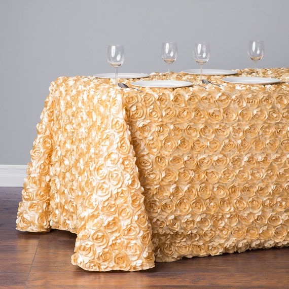 8 Ft Light Gold Rosette Table Cloth 90x156 by SparkleSoiree