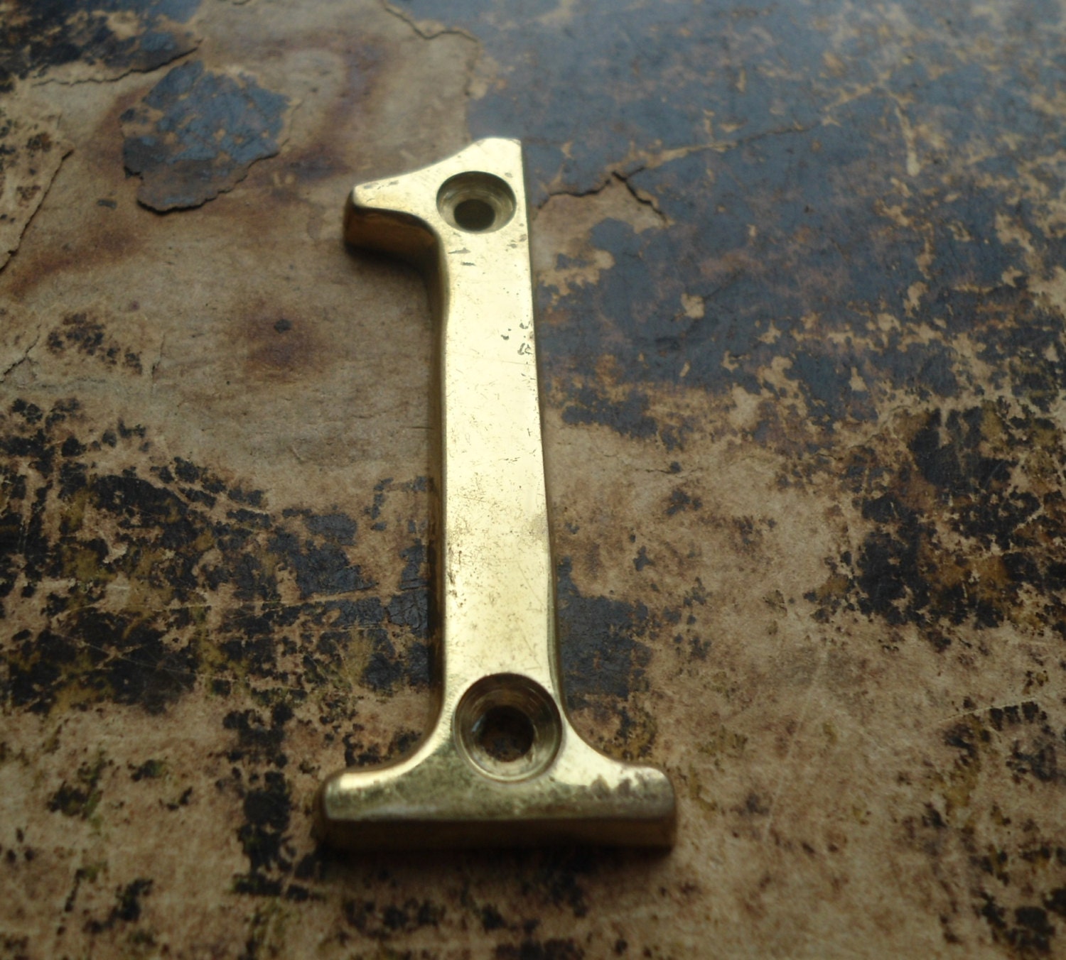 Vintage metal door number one, decorative metal number “1”, number