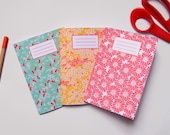 Three notebooks A 6 Japanese paper patterns, lined sheets