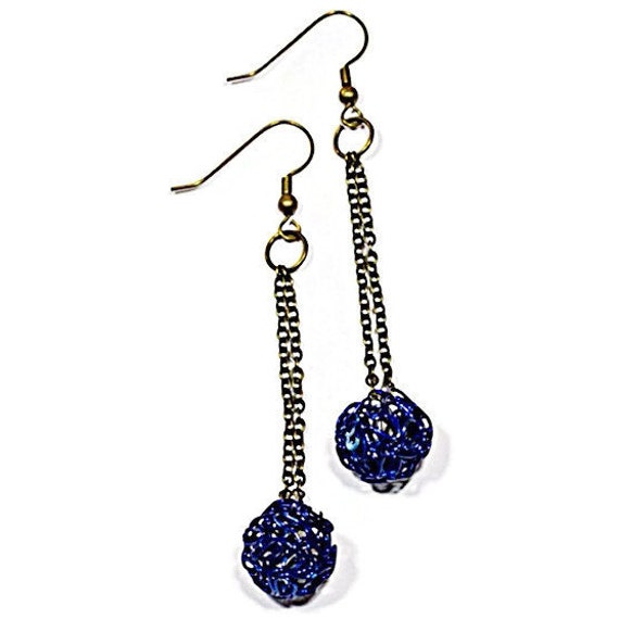 Items similar to Dangly Blue and Antique Gold Earrings on Etsy