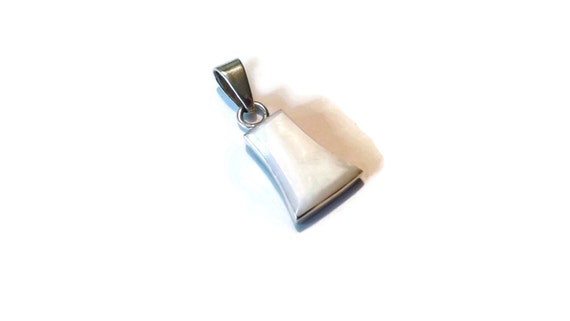 A vintage sterling silver pendant with gorgeous mother-of-pearl.