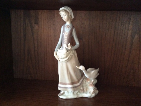 lladro lady with geese