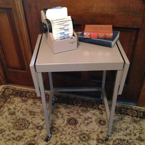 Vintage industrial metal typing typewriter table on wheels