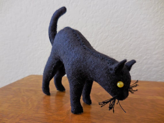 stuffed animal black cat