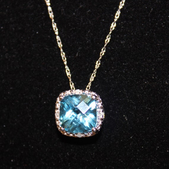 Radiant Blue Topaz Pendant with Diamond Halo 10k white gold - See item details for more info
