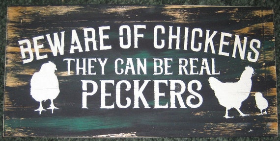 Beware of Chickens They can be real Peckers........ Wall