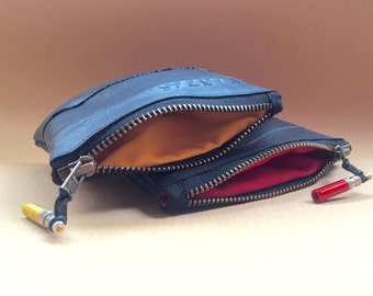 Recycled bicycle inner tube coin purse with cotton lining. Vegan friendly coin pouch. Purse with zip / zipper and lining. Ecofriendly purse.