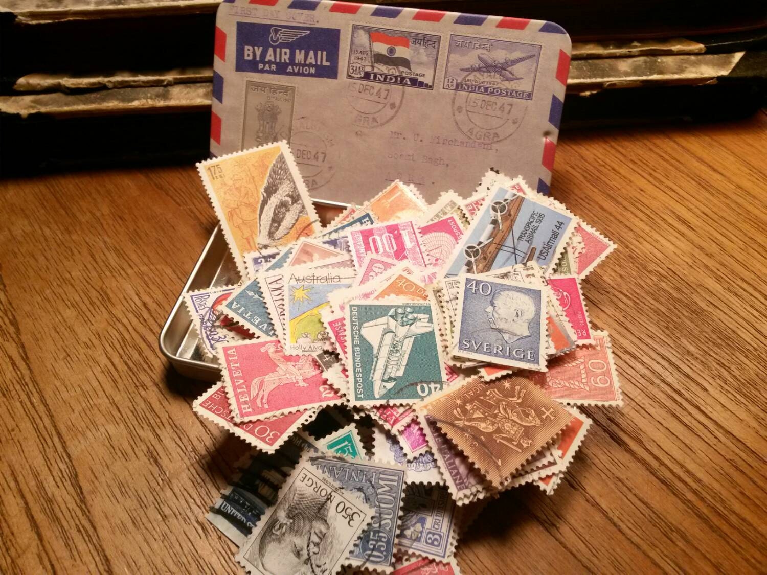 Vintage Postage Stamps in a Retro Tin Box