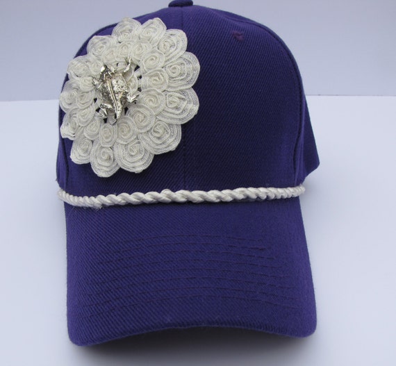 Purple Baseball Cap with Horned Frog Pin on a White by Hidehideho