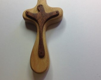 Symbolic (raised symbolism)wooden prayer/holding cross