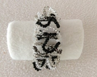 Bracelet with ice crystals and black swirl made