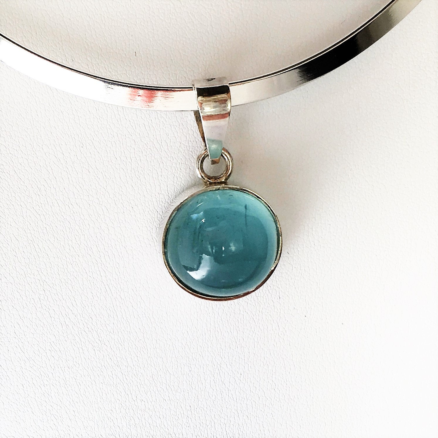 Round Aquamarine Cabochon Pendant Bezel set in Sterling Silver