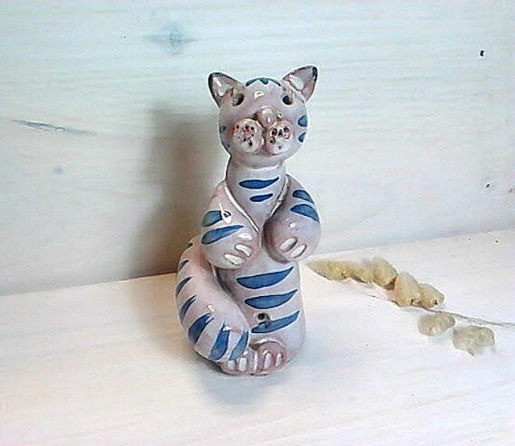 blue ceramic cat figurine