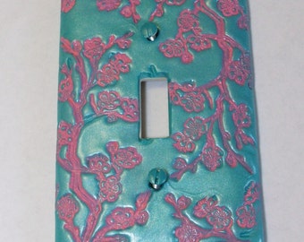 ON SALE Was 11.95: Cherry Blossoms light switch cover in soft shimmer teal and pink