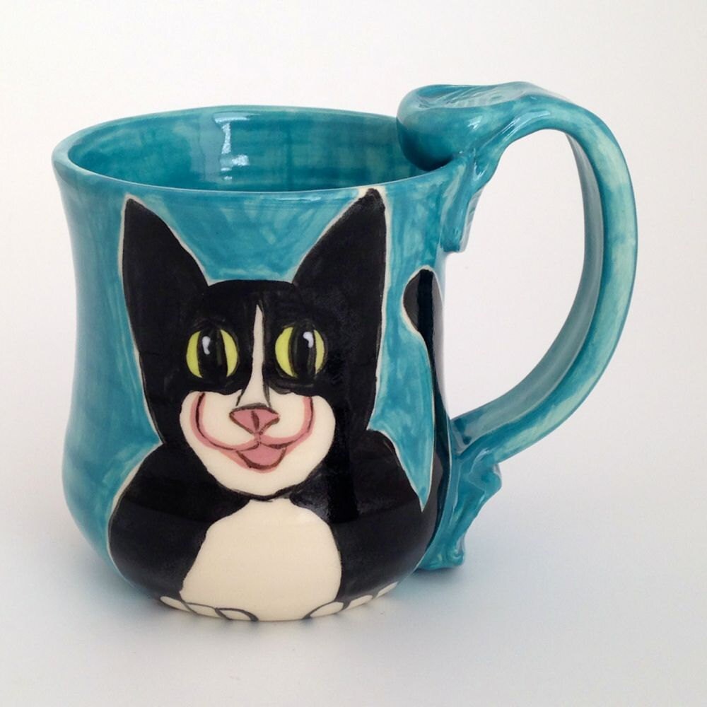 Ceramic Tuxedo Cat Mug Smiling on Radiant Red or by JudyBFreeman