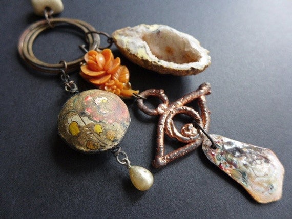 Gaudiloquent. Rustic assemblage necklace in cream and orange with druzy geode.