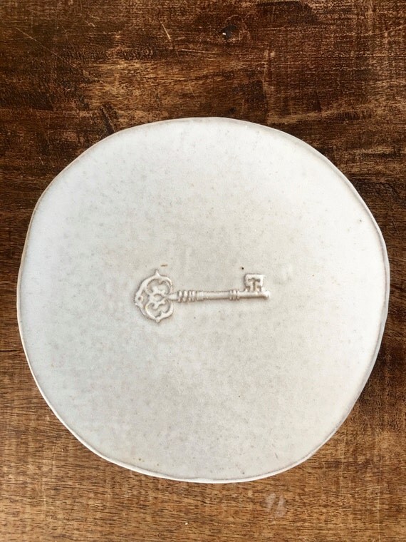 Key dish ceramic plate with a beautiful key stamped white
