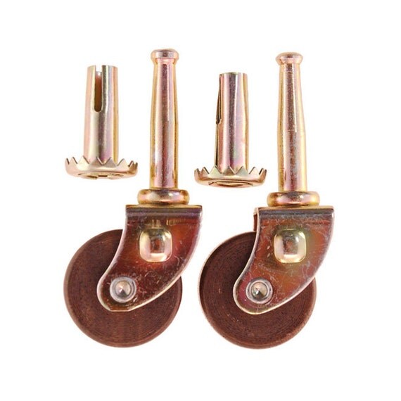 set of 4 wood wheel casters with inserts 1 1/4 dia