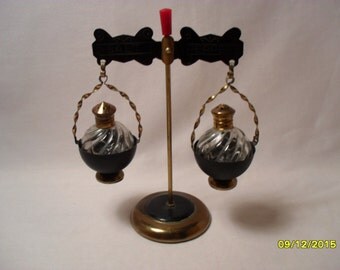 Unusual Vintage Salt and Pepper Shakers with Metal Tabletop Hanging Rack