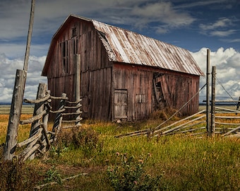 Abandoned Small Prairie Farm with rusted Tractor and Auto by