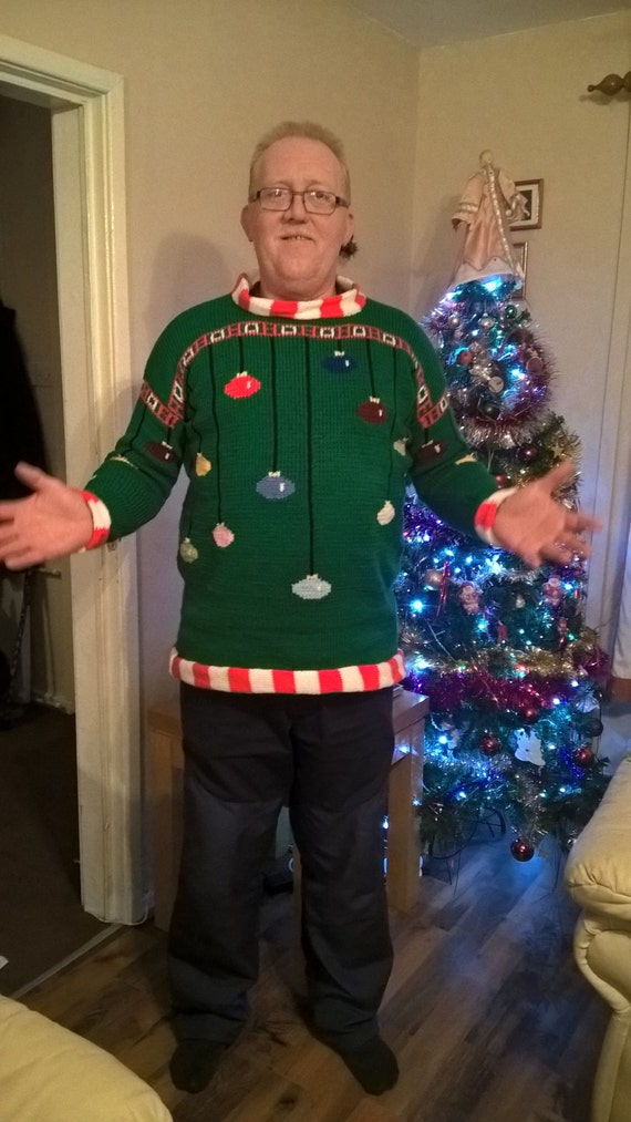 Knitting pattern Arthur Christmas Sweater in adult sizes.