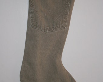 Christmas Stocking made fromTan Wrangler Jeans with country cotton print of animals cuff with a teal lining,