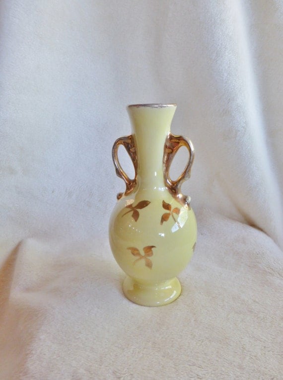 Items similar to Lovely pale yellow ceramic vase with 22k gold handles