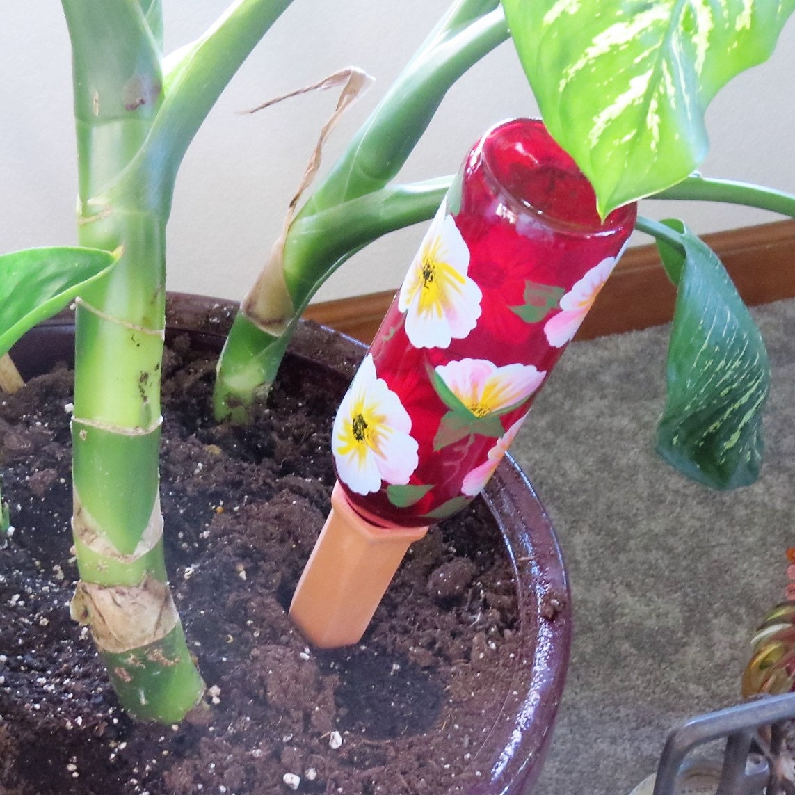 Gravity feed watering system recycled wine bottle by LindasYardArt