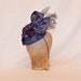 Stunning handmade pure silk deep blue ladies hat decorated with delicate flowers and tulle bow handmade in Yorkshire by Jacqueline Walker Millinery Stunning handmade pure silk deep blue ladies hat decorated with delicate flowers and tulle bow