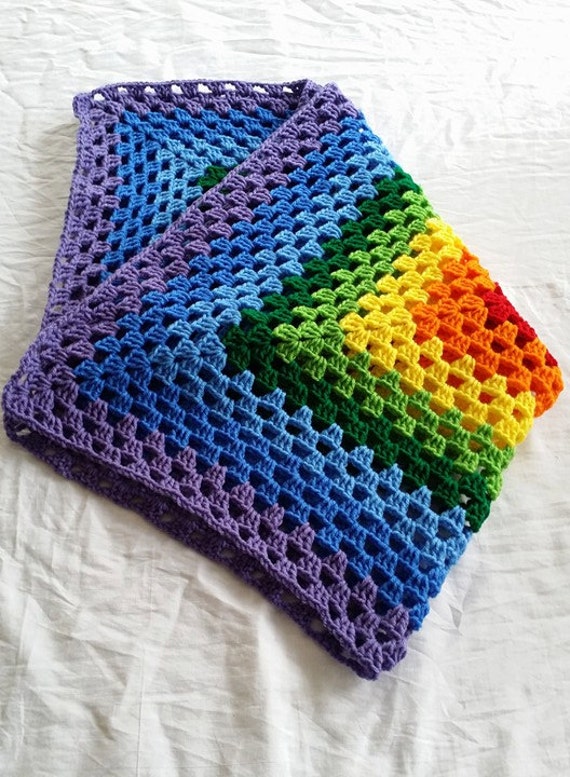 Crochet rainbow granny square blanket by StephanieTwistedYarn