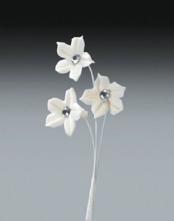 Small Gumpaste Flowers with Rhinestone Center / by CakeWorldUSA