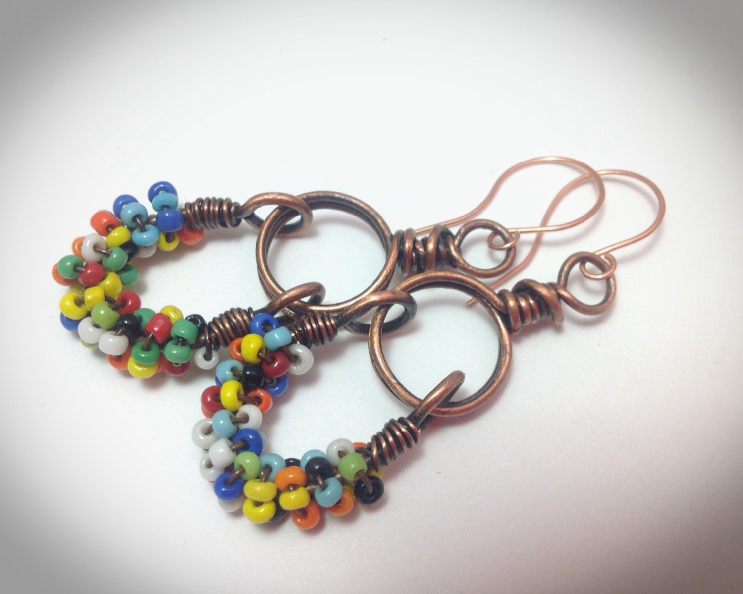 Wire wrapped copper dangling earrings coiled with colorfull