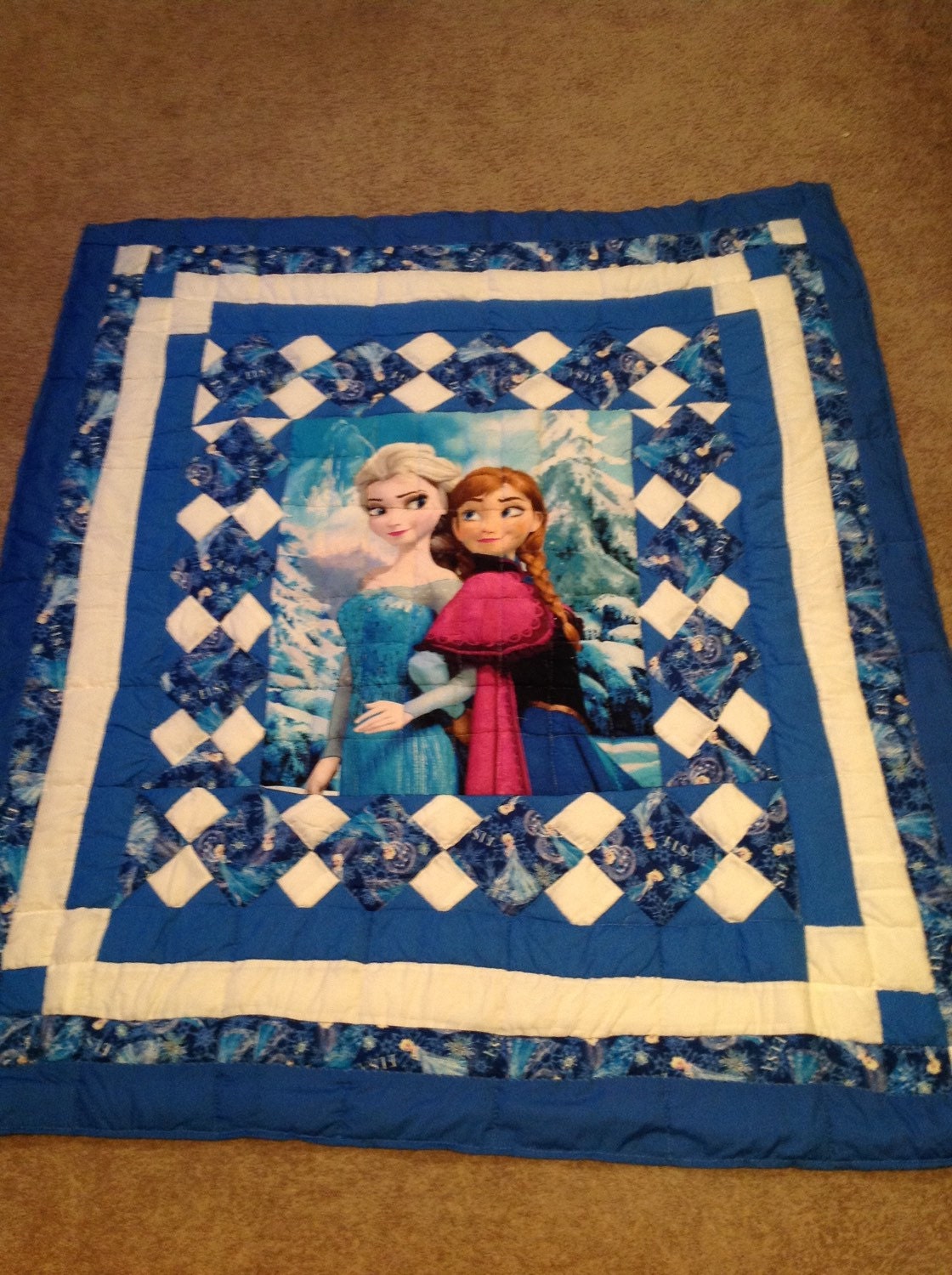 Disney Frozen quilt featuring the Ice Princess Beautiful blue