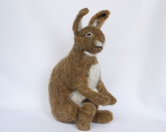 Needle felt rabbit, brown woodland hare with white muzzle