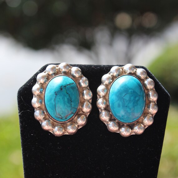 Large Oval Turquoise Earrings 1.5" long by 1" wide in Sterling Silver Circa 1961. Made in Mexico